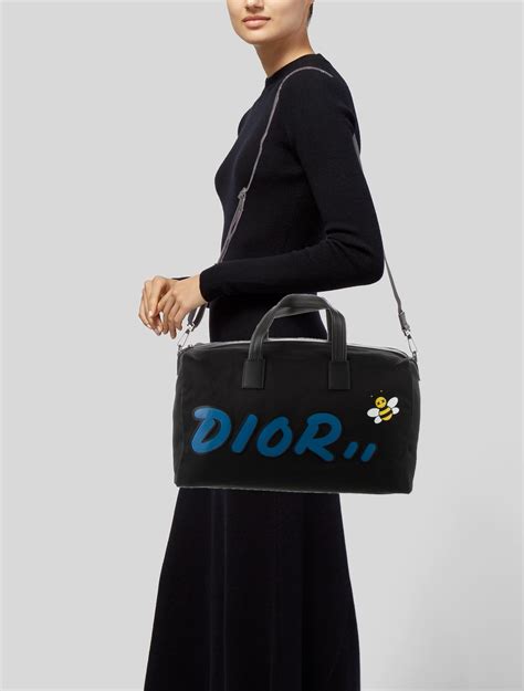 dior kaws duffel carnage duffel|Dior and KAWS .